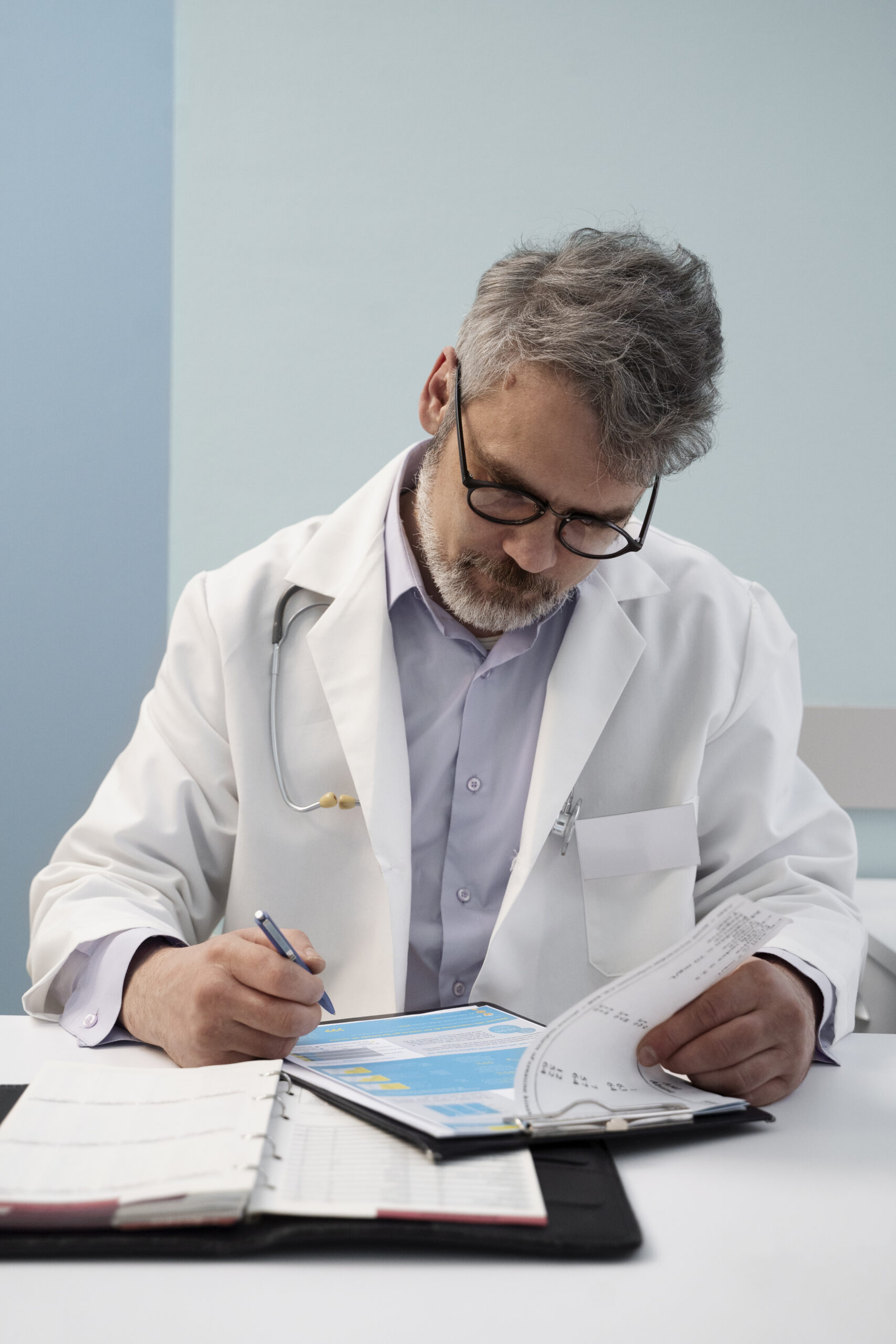 medium-shot-doctor-filling-document